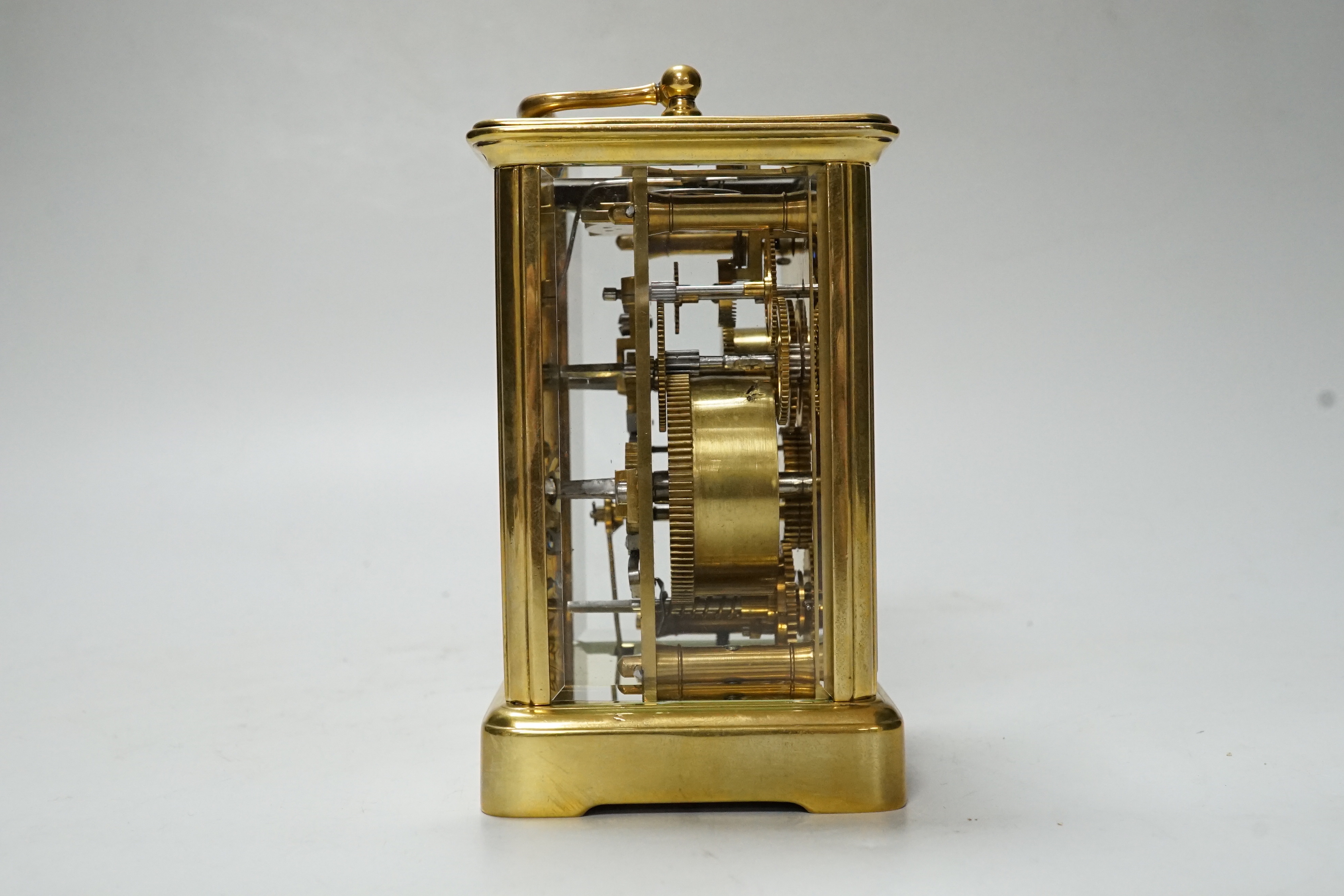 A cased carriage timepiece with alarm